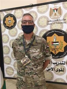 His job and how he supports Palestinian security forces within a USA led mission